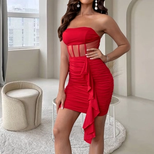 Detail showing red strapless mini dress with mesh patchwork and side ruffle design