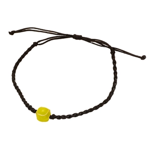 Detail of adjustable black woven bracelet featuring a neon yellow tennis ball charm