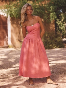 Detail of pink cotton sundress featuring a ruched waist and flattering sweetheart neckline
