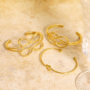 Ensemble de 3 bracelets joncs ouverts géométriques évidés plaqués or 18 carats en acier