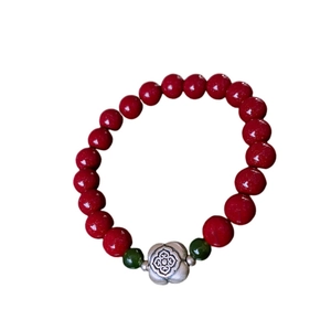 S925 silver flower cinnabar Hetian jade bracelet with red beads on white background