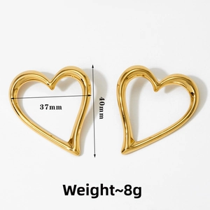 Detailed view of large gold heart earrings with 37mm x 40mm size measurements and 8g weight