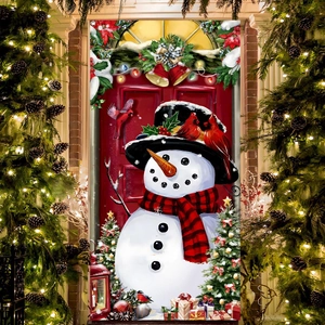 Christmas snowman door banner with red plaid scarf and holiday decorations on house door