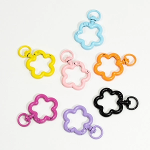 Colorful flower-shaped spring rings in seven bright colors for DIY jewelry making