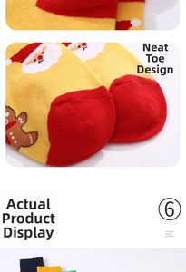 Close-up of neat toe seam and festive gingerbread pattern on yellow Christmas socks