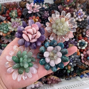 Handcrafted natural crystal flower ornaments featuring amethyst and rose quartz stones