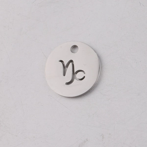 Detailed view of Capricorn zodiac sign cut-out pendant made of silver stainless steel