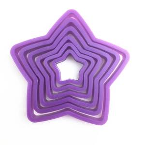 Five-piece purple plastic star-shaped cookie cutters in nested sizes for DIY baking