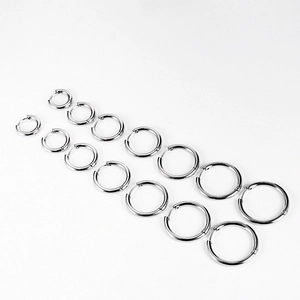 Minimalist stainless steel hoop earrings in various sizes with a high-polished silver finish