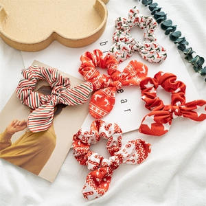 Set of 5 Christmas plush rabbit ear hair scrunchies with red and white holiday patterns