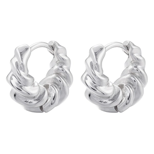 Silver twisted rope hoop earrings with French vintage croissant texture on white background