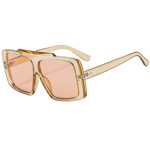 Oversized square sunglasses with amber frames and peach tinted lenses in a classic style