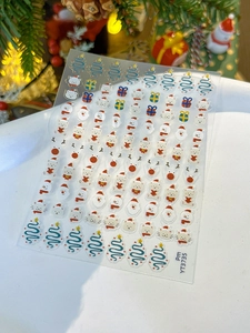 Détails de stickers à ongles de Noël avec Père Noël et chats pour nail art festif élégant
