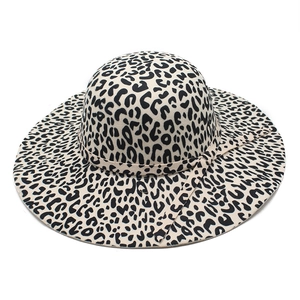Classic leopard print wide brim wool fedora hat with decorative band on white background