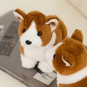 Detailed view of plush corgi dog toy with soft brown fur and realistic cute features