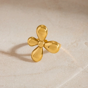 Elegant gold flower ring in stainless steel with minimalist four-petal design for women