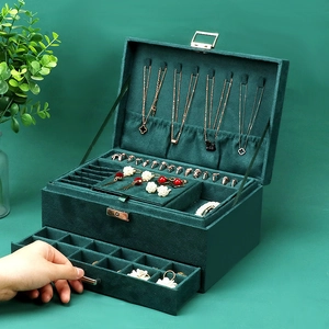 Vintage dark green velvet jewelry organizer box with multi-layer storage and secure lock