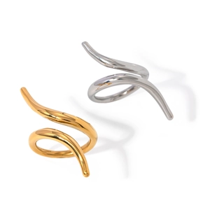 Polished 18k gold and silver stainless steel intertwined spiral rings on white background