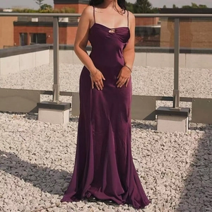 Elegant purple satin maxi slip dress with thin straps and cutout neckline detail