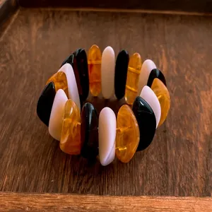Minimalist geometric acrylic stretch bracelet with black, white and amber resin plates