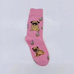 Detailed view of pink cotton socks featuring cute pug and bubble tea cartoon patterns