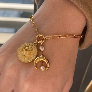 18k gold plated stainless steel bracelet with vintage coin and crescent moon charms