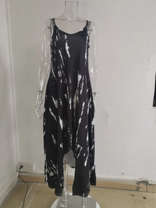 Detail view of black and white tie-dye sleeveless maxi dress with asymmetrical hem