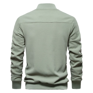 Rear view of men's casual stand collar jacket featuring waffle texture and ribbed trim