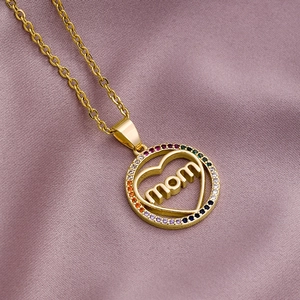 Golden Mom necklace with rainbow gemstones on a purple silk background