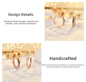 Detailed view of rose gold hoop earrings with multi-colored rainbow zircon stones