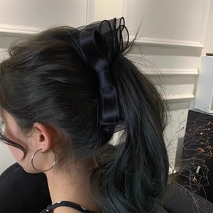 Elegant black double-layered mesh bow banana clip for high ponytail on female model