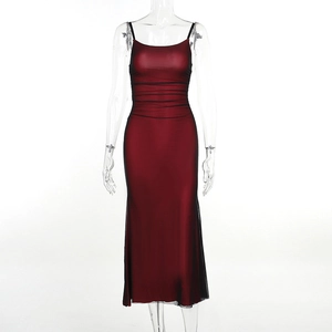 Detail of burgundy and black contrast mesh dress featuring a slim fit midi-length silhouette