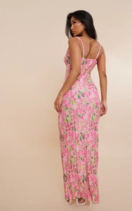 Detailed view of the pleated texture and pink floral pattern on a slim-fit camisole dress