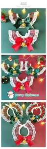 Detailed view of Christmas pet lace collar with plaid bow, bells, and festive charms