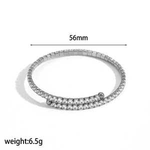 Detail view of silver zirconia bangle with 56mm inner diameter and 6.5g weight specs