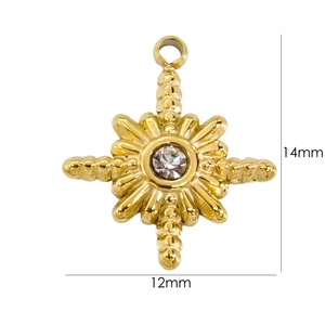 Macro detail of 14K gold plated star pendant with clear stone showing 14mm size