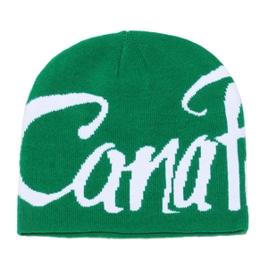 Detail of green knitted beanie featuring thick white Caraf jacquard lettering texture