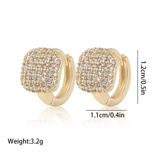 Detailed view of 14K gold plated huggie earrings with pave cubic zirconia and dimensions