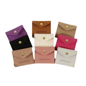 Portable microfiber jewelry storage pouch in various colors with gold metal snap closure