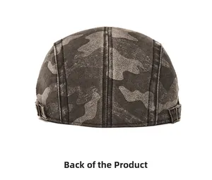 Detail view of the vintage camo flat cap showing the adjustable metal buckle and washed fabric