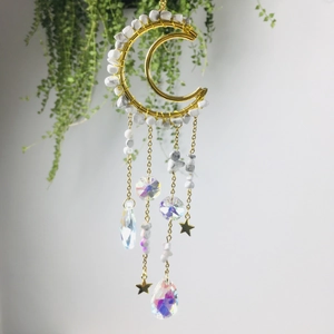 Golden moon crystal suncatcher with natural amethyst stones and prisms for boho decor