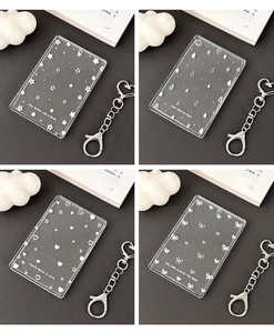 Detailed grid view of glitter acrylic card holders with decorative heart keychains