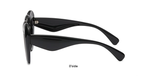 Close-up of black heart-shaped sunglasses featuring sleek frames and integrated nose pads