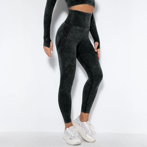 Detail of acid wash seamless yoga set showing ribbed textures and thumbhole cuffs