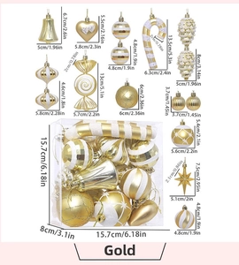 Detailed view of gold and white Christmas ornaments with sizes in a clear display box