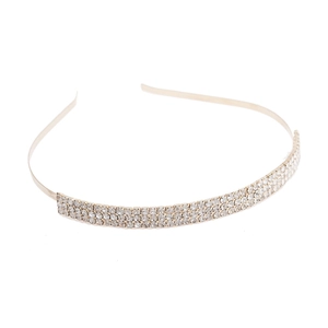 Elegant gold metal headband with three rows of sparkling rhinestones on white background