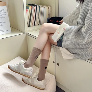 Khaki mid-calf socks with heart embroidery and Follow your heart text detail