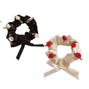 Satin scrunchies with 3D rose buds and bows in black and champagne silk fabric