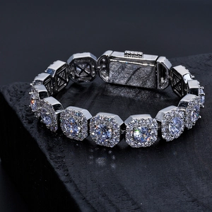 Macro shot of silver hip-hop bracelet with square links and pavé-set round zircon stones