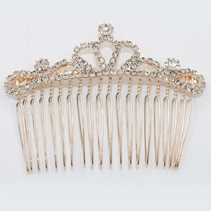 Golden crown hair comb accessory with sparkling rhinestones for bridal hair styling